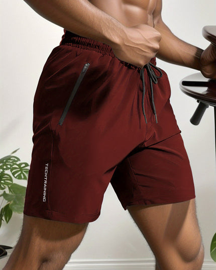 Short de sport performant pour homme - Tissu extensible à séchage rapide, poches zippées sécurisées, cordon de serrage ajustable