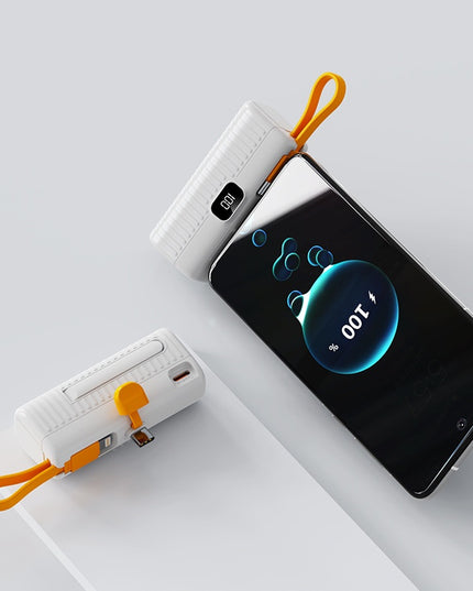 Batterie externe compacte et portable en forme de capsule