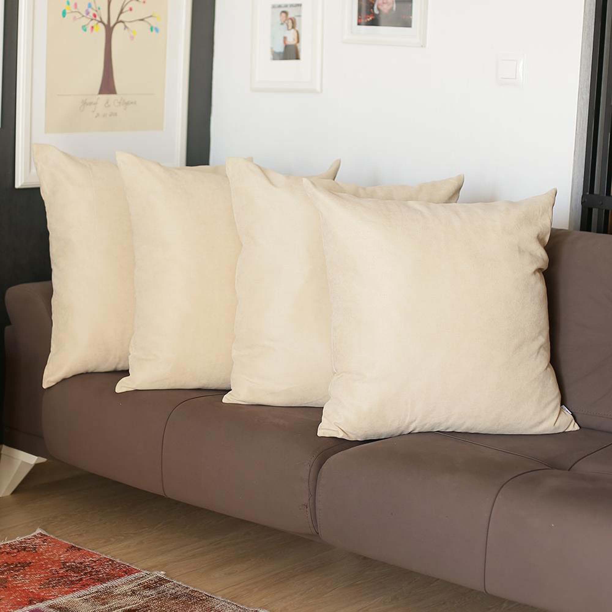 Lot de quatre housses de coussin zippées en polyester beige 55 x 55 cm