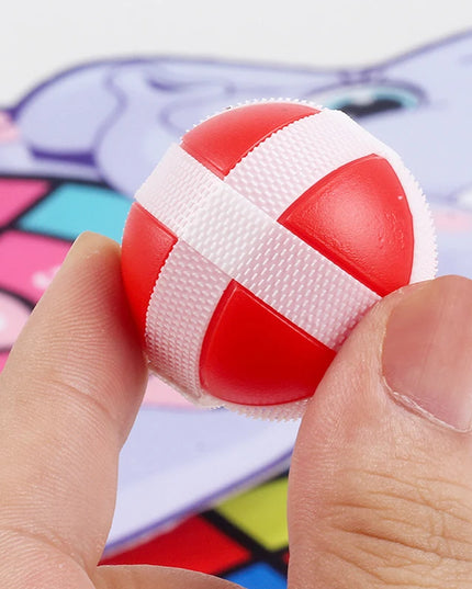 Jeu de sport Montessori avec 2 balles collantes